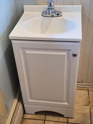 Bathroom vanity and faucet